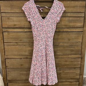 Bright floral; mini sun dress; v cut front and back; two ties on back; SIZE 0